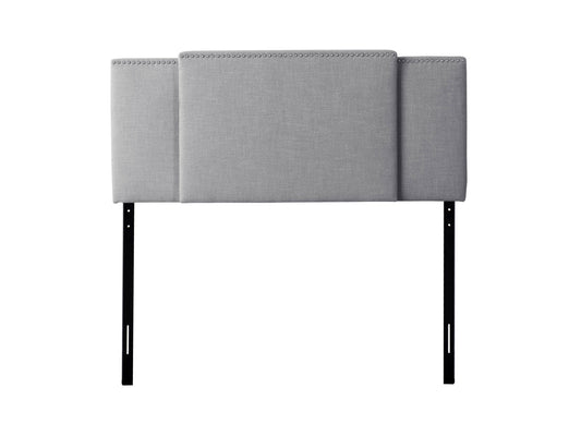 Adjustable grey headboard with tufted fabric, sleek design, and sturdy build, perfect for modern bedrooms.