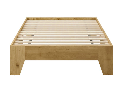 Dark wood twin platform bed with slatted headboard and footboard, featuring a minimalist design and sturdy construction. Ideal for small bedrooms, guest rooms, or kids' rooms.