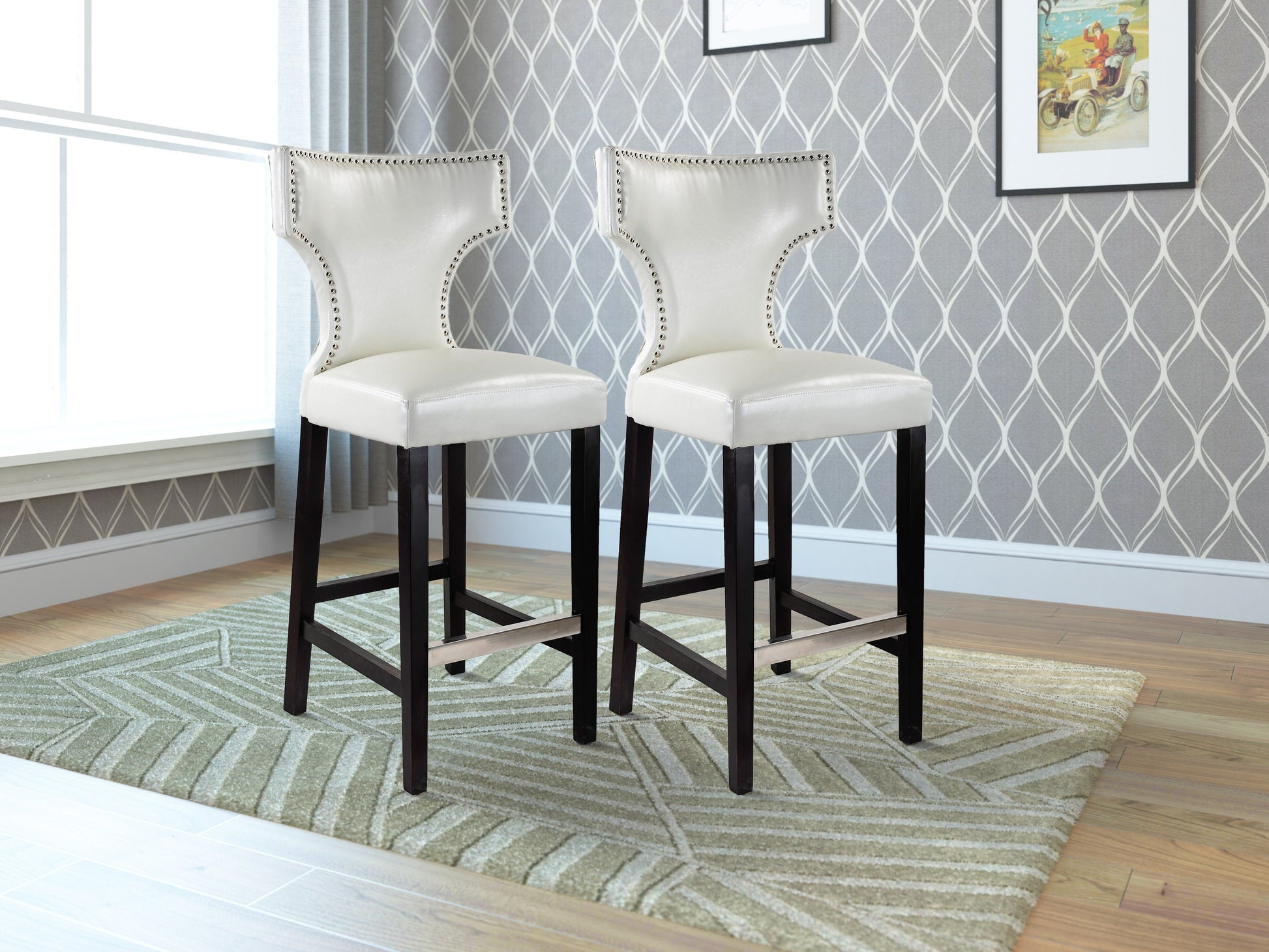 White bar height bar stools set of 2, featuring sleek chrome legs, cushioned seats with white faux leather upholstery, and footrests for added comfort, perfect for modern kitchen or bar settings.