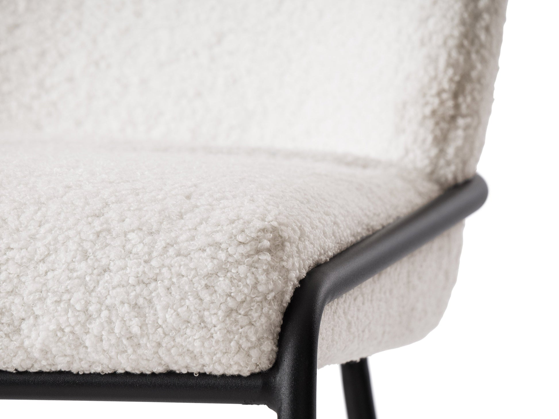 White boucle bar stool with plush, textured upholstery, sleek wooden legs, and a comfortable backrest, ideal for modern kitchens or home bars.