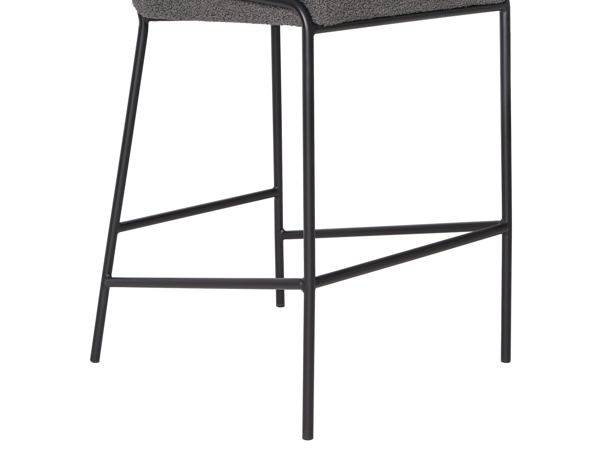 Grey boucle bar stool with plush texture, featuring a curved backrest, black metal legs, and footrest, perfect for modern kitchens and home bars.