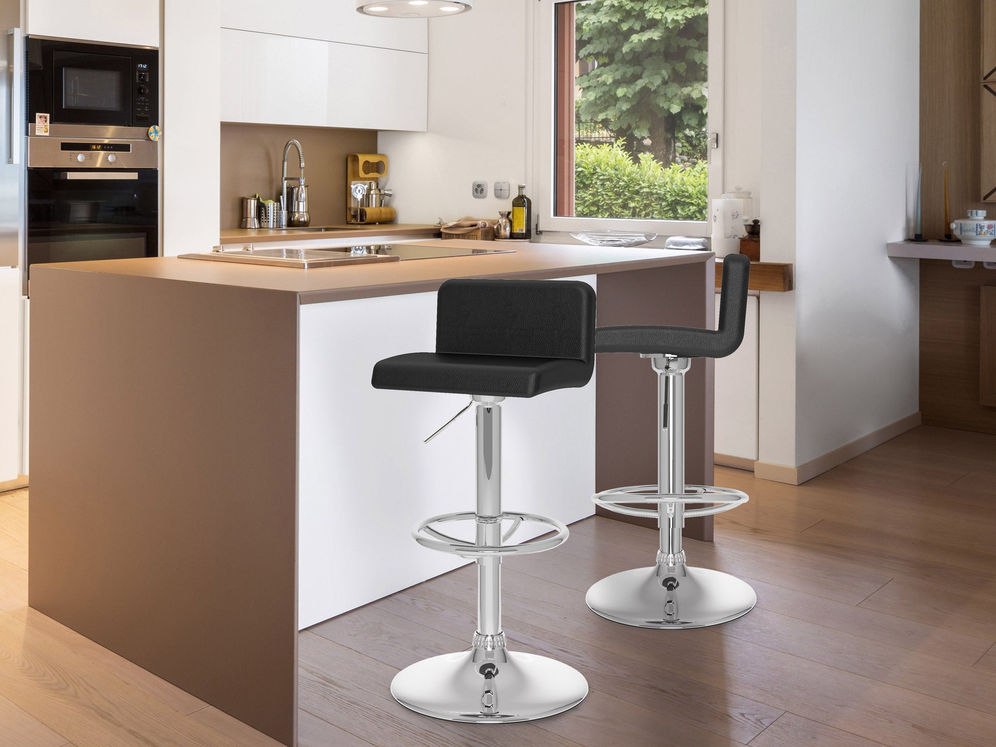 Black low back bar stools, set of 2, featuring sleek metal legs, cushioned seats with faux leather upholstery, and a minimalist design perfect for modern kitchen islands or home bars.