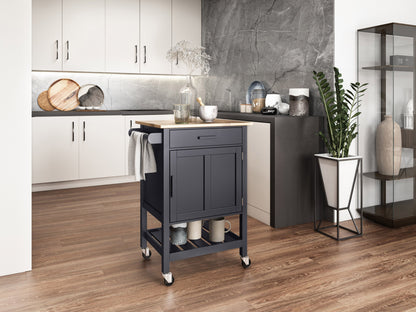 Black kitchen cart on wheels with two shelves, a drawer, and a towel rack. Made of sturdy wood with a sleek black finish. Ideal for extra storage and mobility in the kitchen.