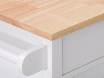 White kitchen cart on wheels with a natural wood top, featuring two drawers, a lower shelf, and side towel rack. Ideal for additional kitchen storage and workspace.