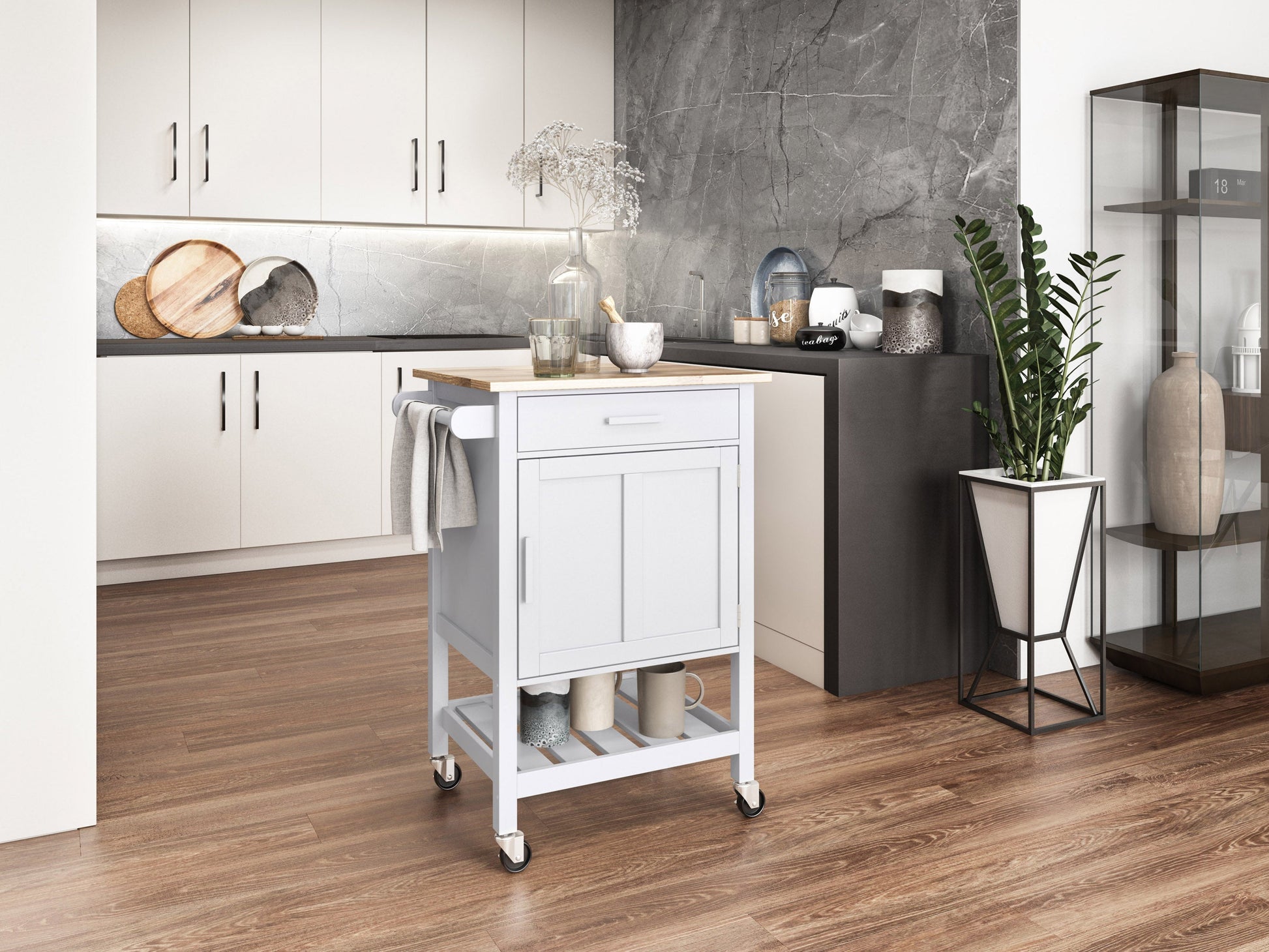 White kitchen cart on wheels with a natural wood top, featuring two drawers, a lower shelf, and side towel rack. Ideal for additional kitchen storage and workspace.