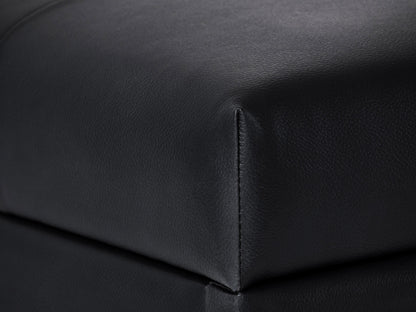 Black vegan leather storage ottoman with tufted top, square shape, and hidden compartment for extra storage.