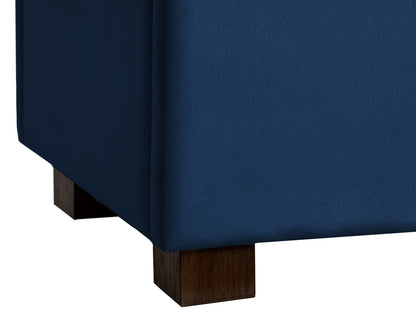 Blue velvet ottoman with storage, featuring a plush, tufted top, sleek gold legs, and a spacious interior compartment for living room organization and seating.