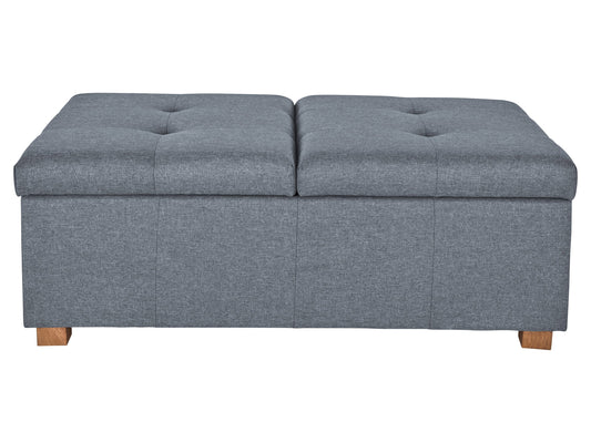 Grey double storage ottoman with tufted top, soft fabric upholstery, and sturdy wooden legs, ideal for living room organization and extra seating.