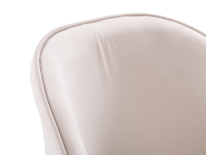 Beige velvet dining chair with gold metal legs, tufted backrest, and curved, modern design.