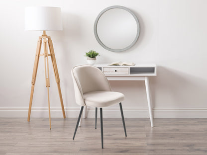 Beige velvet dining chair with gold metal legs, tufted backrest, and curved, modern design.