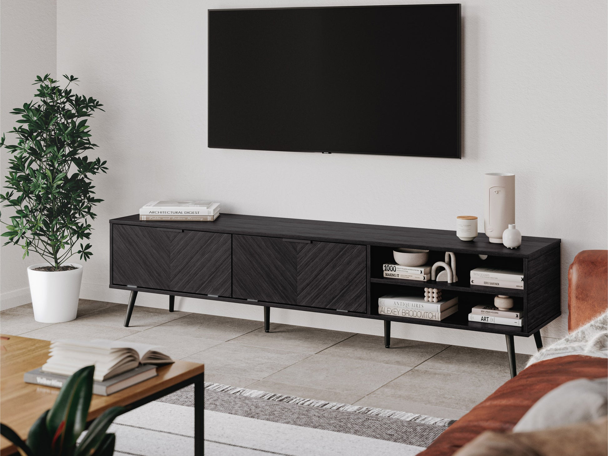 Grey TV stand for TVs up to 85 inches with sleek design, open shelving, and cabinet storage, featuring a modern, minimalist look with a wood grain finish and metal accents.