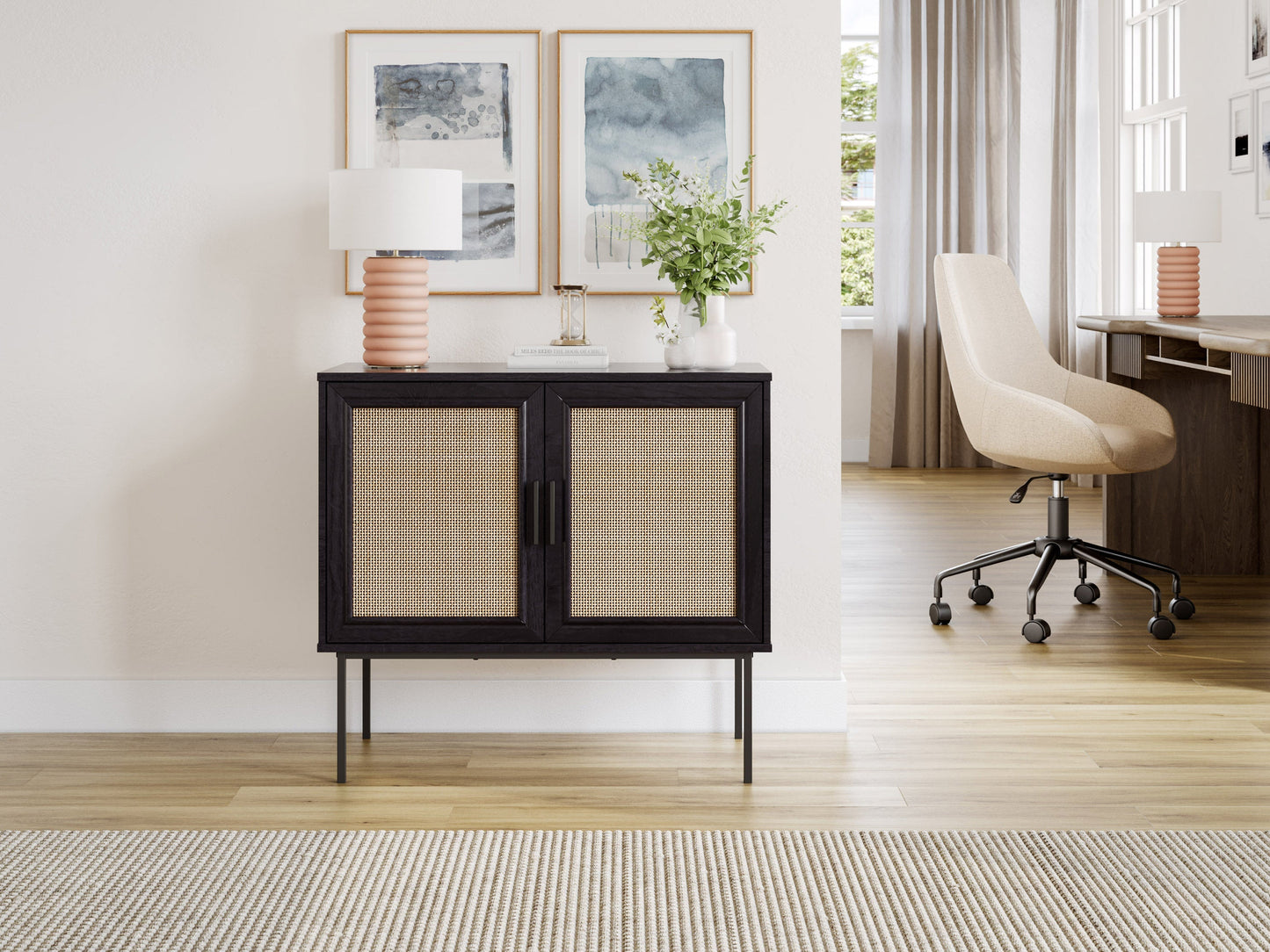 Black accent dining cabinet with sleek metal handles, featuring a modern design, two spacious drawers, and a textured wood finish. Ideal for stylish dining room storage and organization.