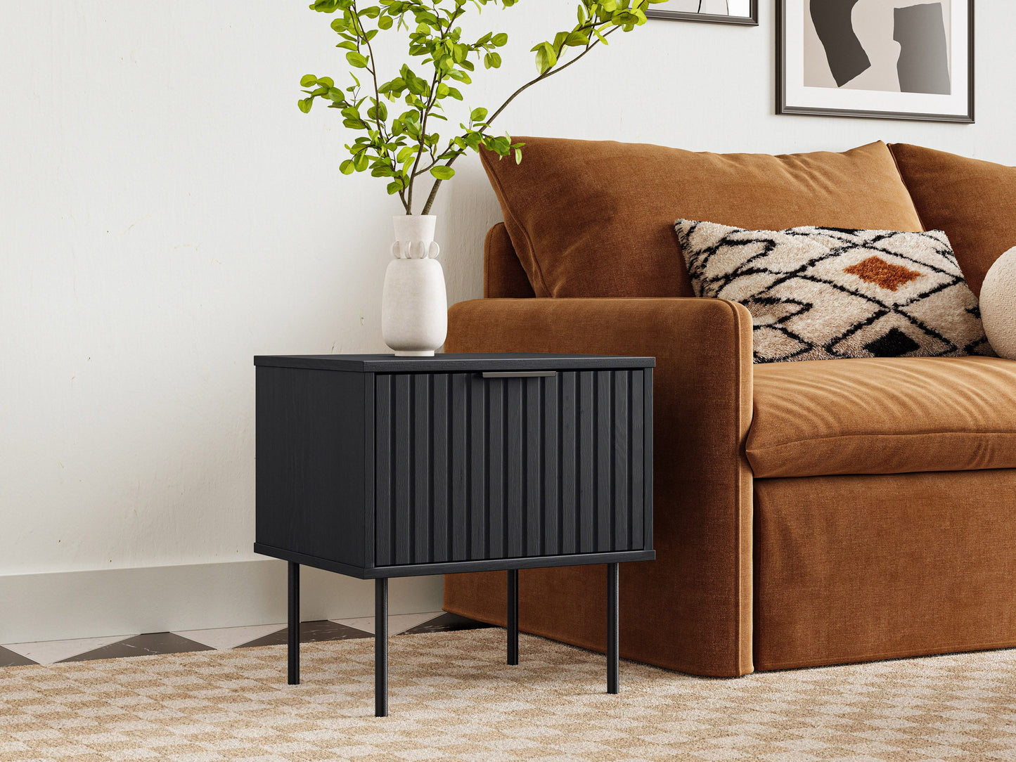 Black fluted side table with a round top, sleek black finish, and vertical grooves for a modern, elegant look. Made of durable wood, perfect for living rooms or bedrooms as a stylish accent piece.