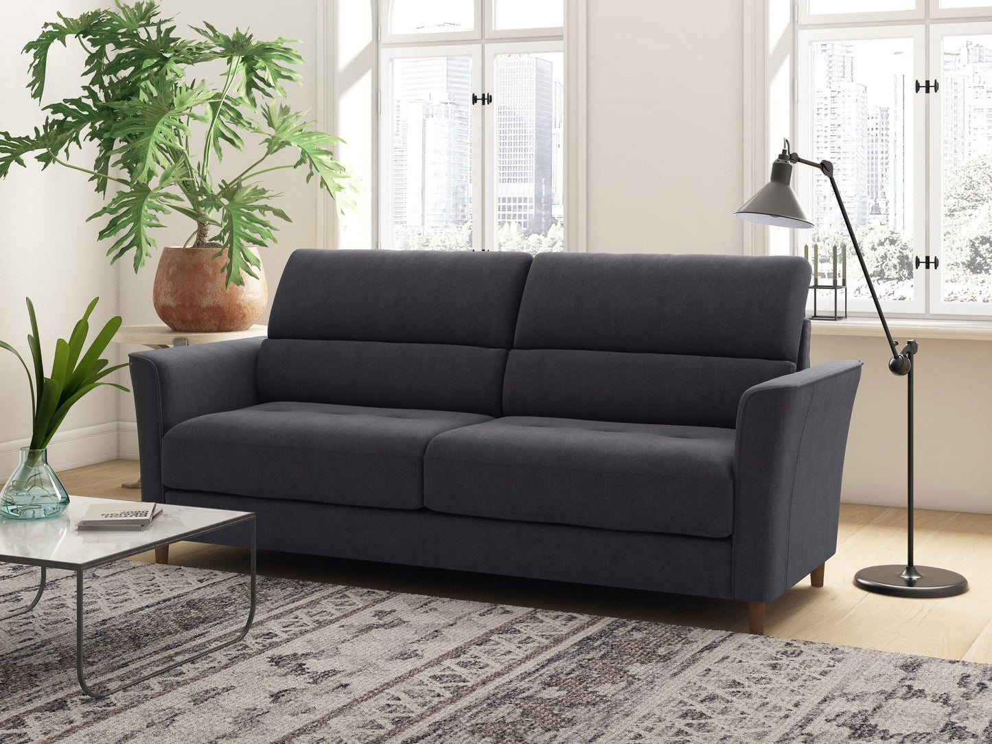 Dark grey 3-seater sofa with plush cushions, modern design, and wooden legs. Upholstered in durable fabric, perfect for contemporary living rooms.