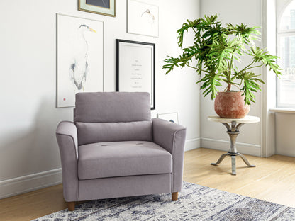 Cream-colored armchair with plush cushions, wooden legs, and a textured fabric finish. Ideal for cozy living rooms.