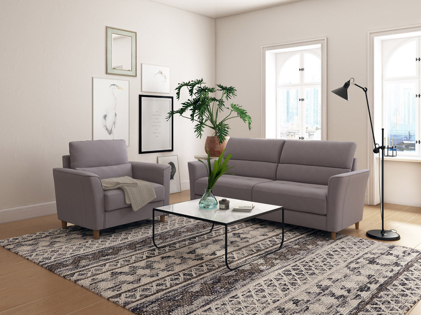 Light grey 3-seat sofa and matching chair set with plush cushions, modern design, and wooden legs, perfect for living room decor. Durable fabric upholstery, sleek lines, and comfortable seating for a stylish home.