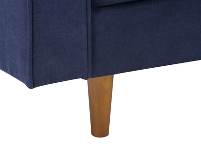 Navy blue accent chair with matching ottoman, featuring plush velvet upholstery, sleek wooden legs, and a modern design perfect for living rooms or reading nooks.