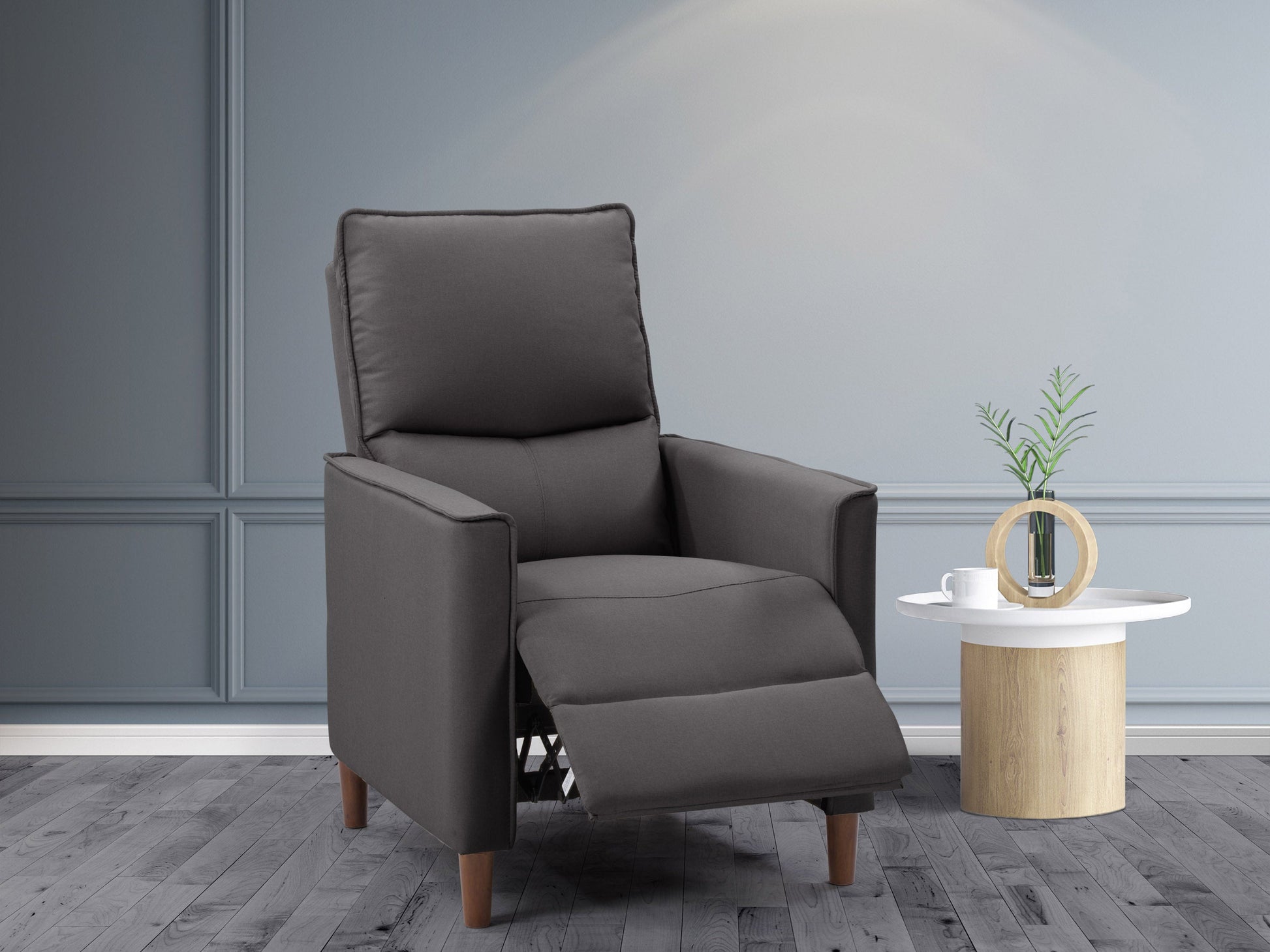 Dark grey mid-century recliner with wooden legs, tufted backrest, and plush fabric upholstery. Ideal for modern living rooms, offering comfort and style.