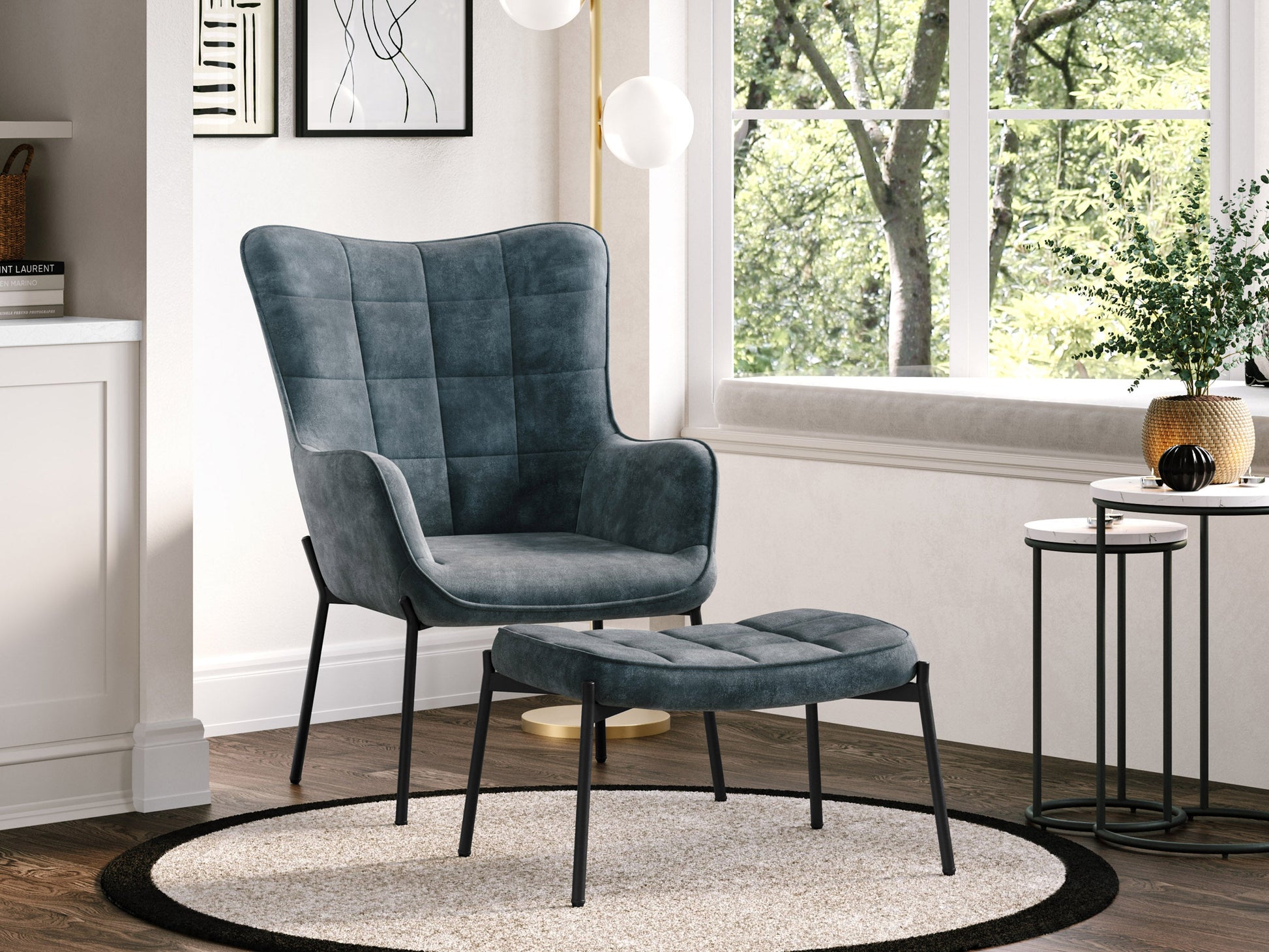 Velvet accent chair with matching ottoman in dark teal, featuring plush upholstery, sleek gold metal legs, and a modern design perfect for living rooms or reading nooks.