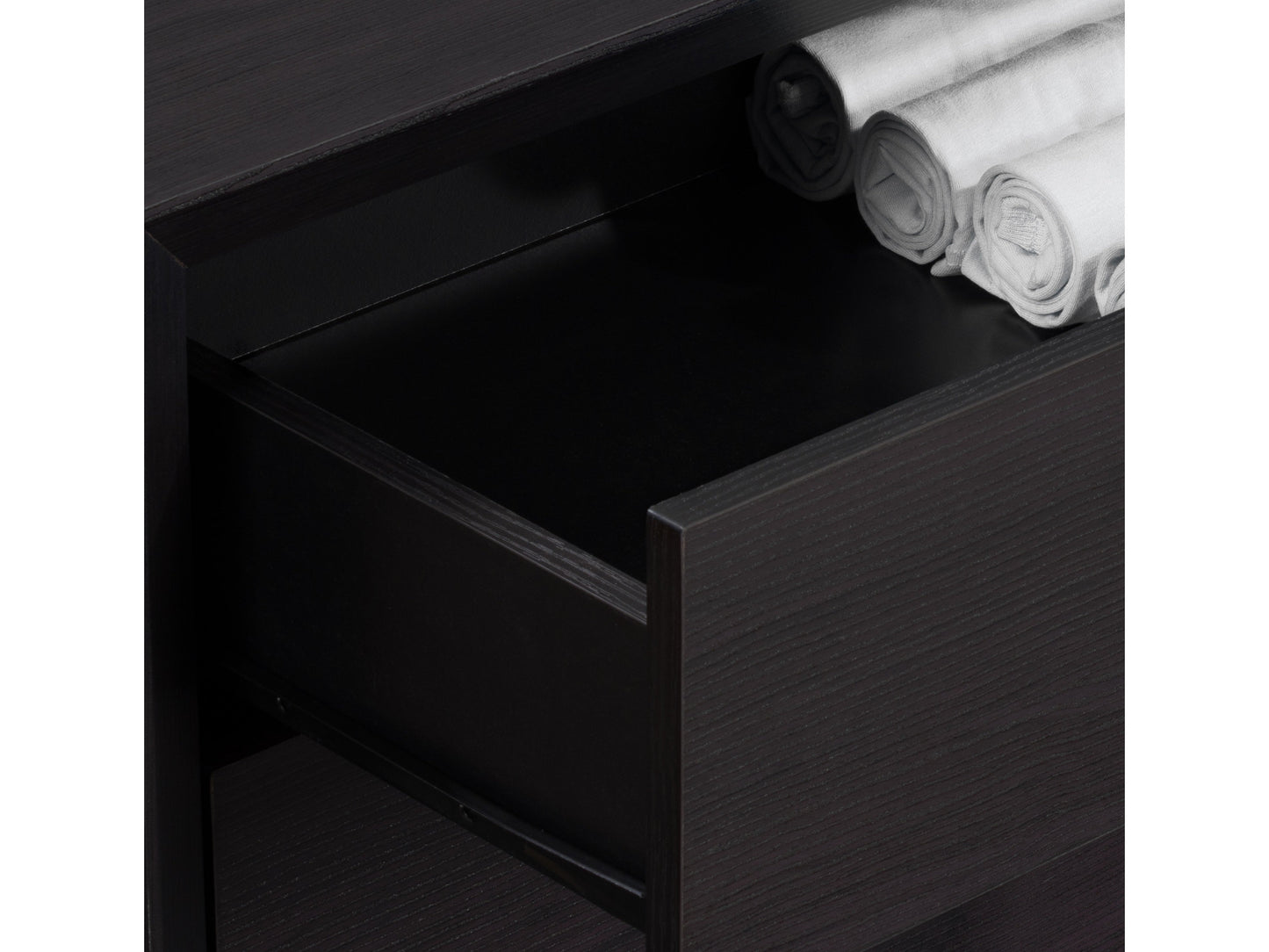 Black 8 drawer dresser with sleek modern design, matte black finish, metal handles, and ample storage space. Ideal for contemporary bedrooms and living spaces. Durable wood construction with smooth drawer operation.