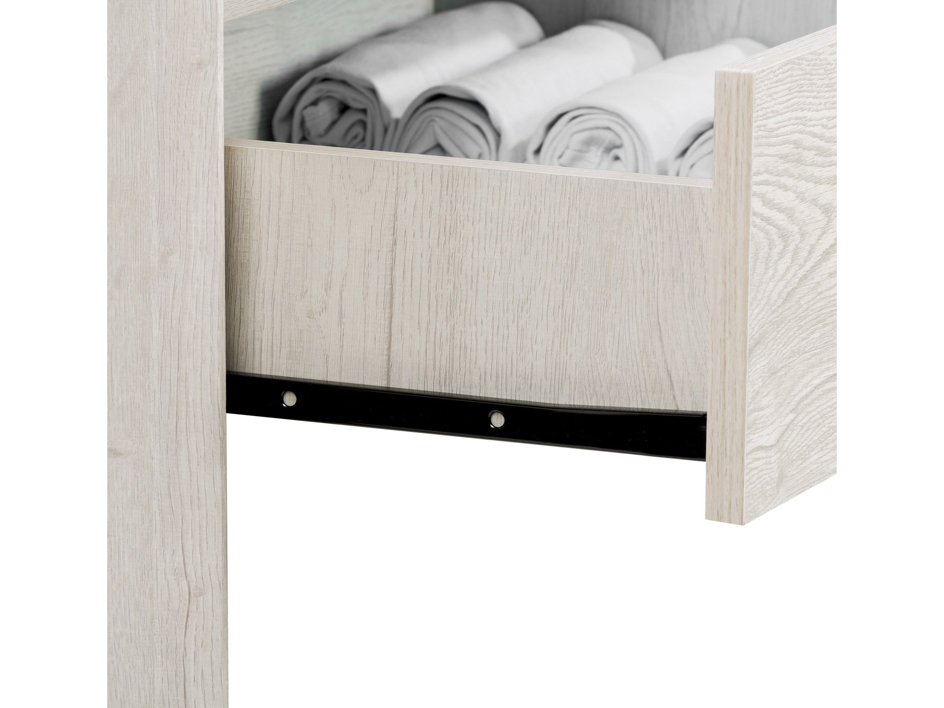 White washed oak tall bedroom dresser with five drawers, silver handles, and a smooth finish. Features ample storage space and a minimalist design, ideal for modern and contemporary bedroom decor.