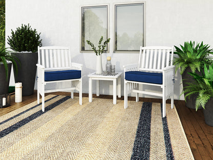 Washed white 3 piece patio conversation set with two cushioned chairs and a glass-top coffee table, featuring weather-resistant wicker and soft beige cushions, perfect for outdoor relaxation.