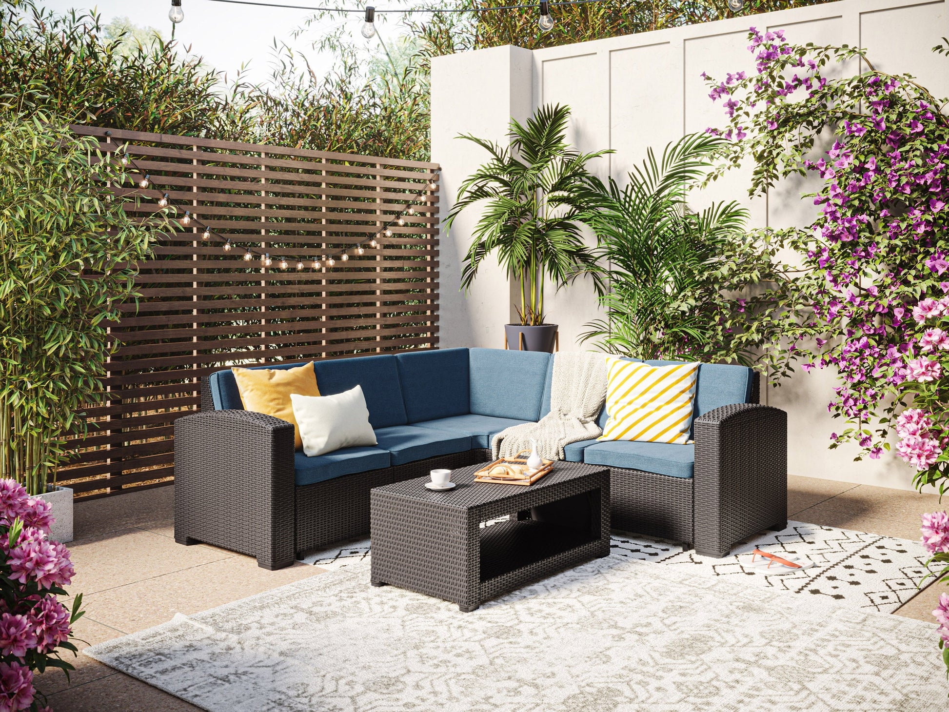 Black and blue outdoor wicker sectional set, 6-piece patio furniture featuring durable wicker material, plush blue cushions, and modular design for customizable seating arrangements in outdoor spaces.