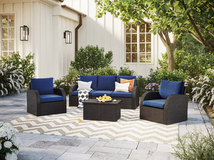 Blue outdoor sofa set with six pieces, featuring durable wicker construction, plush navy cushions, and a glass-top coffee table. Ideal for patio lounging and outdoor gatherings. Weather-resistant and stylish.