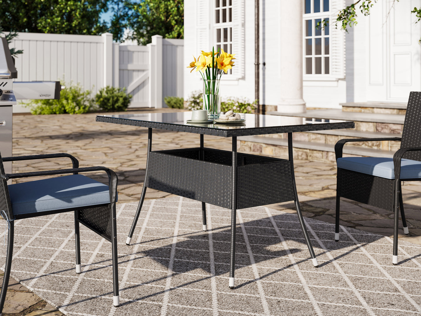 Black outdoor dining table with sleek aluminum frame, tempered glass top, and weather-resistant finish, ideal for patio or garden use. Rectangular shape with modern design, perfect for outdoor dining and entertaining.