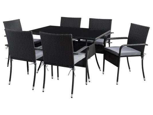 Gray wicker patio dining set with six cushioned chairs, rectangular glass-top table, and weather-resistant materials, perfect for outdoor dining and entertaining.