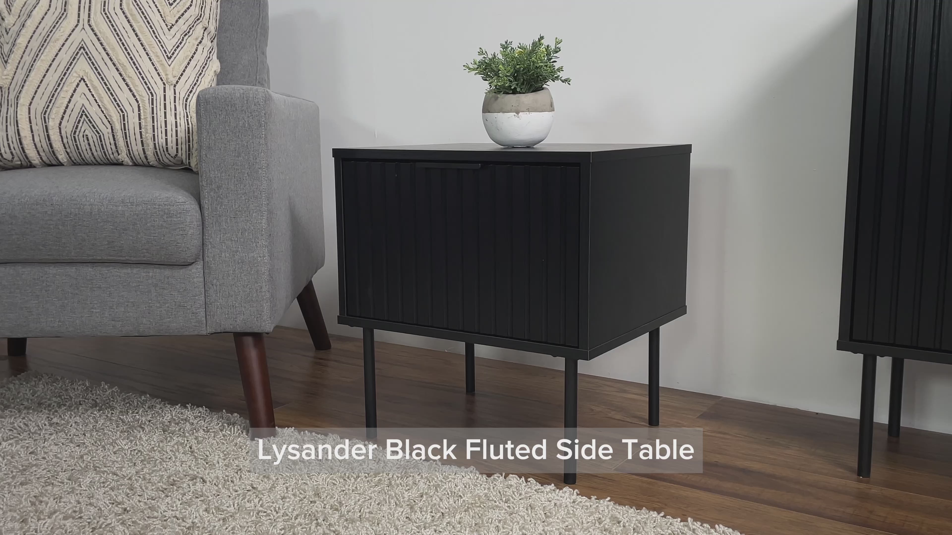 Load video: Lysander Black Fluted Side Table Product Video