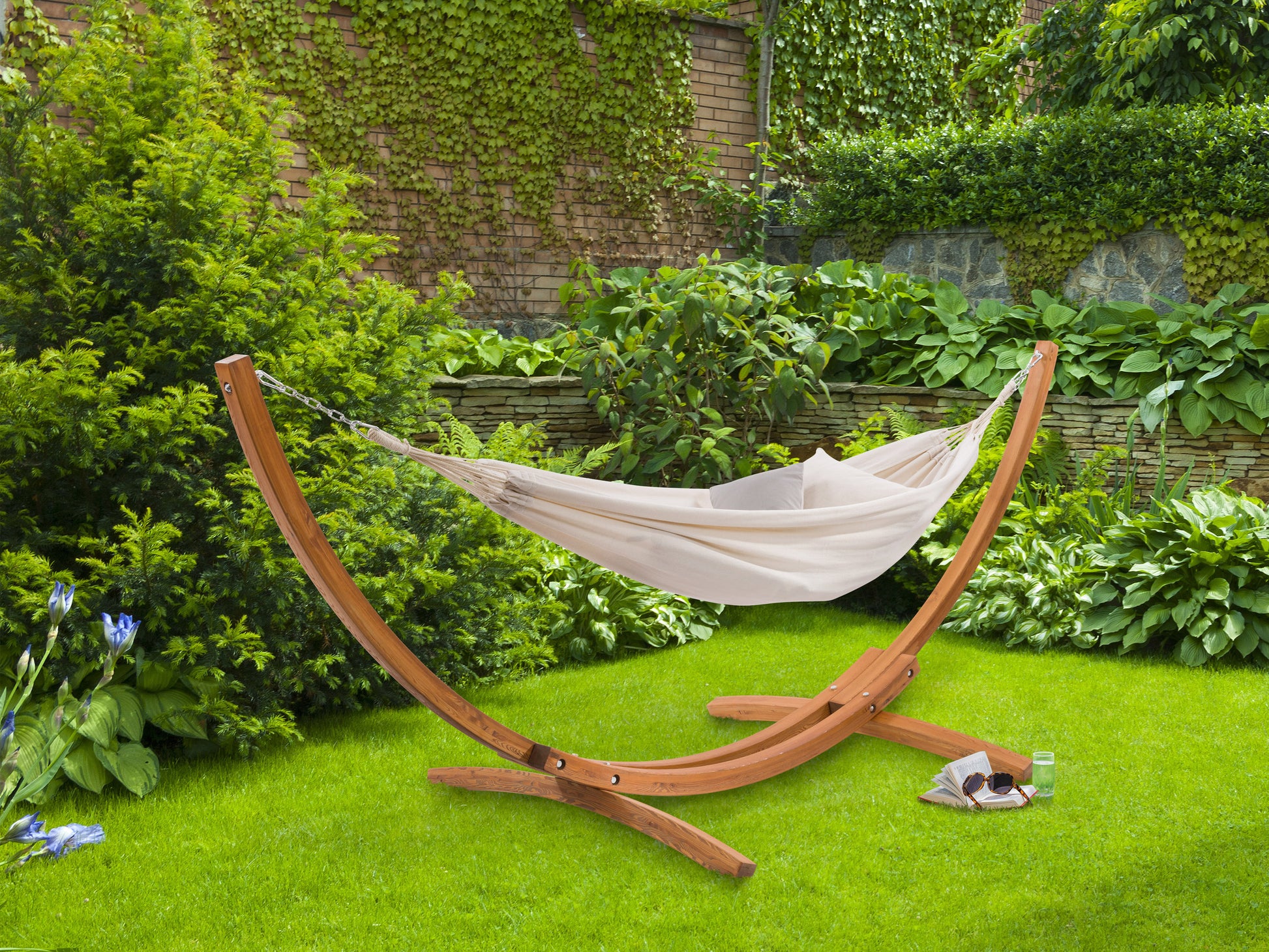 Wooden stand hammock with beige fabric, featuring sturdy wooden frame, durable woven cloth, and sleek design. Ideal for outdoor relaxation, patio use, and garden lounging.