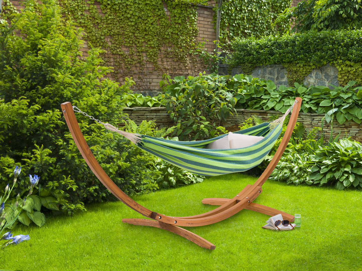 Natural wood stand hammock with beige fabric, featuring a comfortable design for outdoor relaxation, ideal for patios and gardens. Durable wood frame and soft, weather-resistant fabric for a cozy lounging experience.