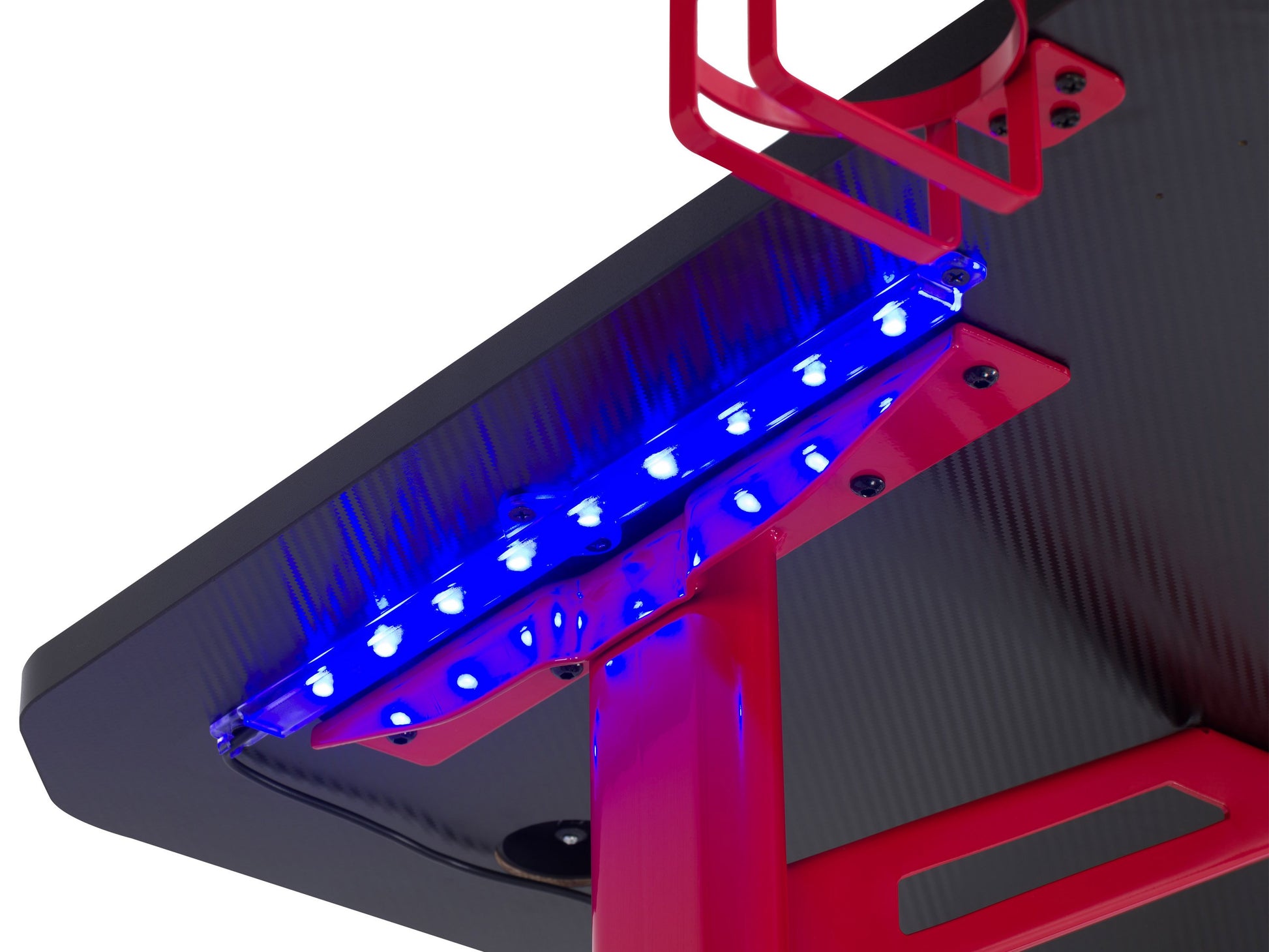 Red and black gaming desk with LED lights, carbon fiber texture, built-in cup holder, headphone hook, and cable management grommets.