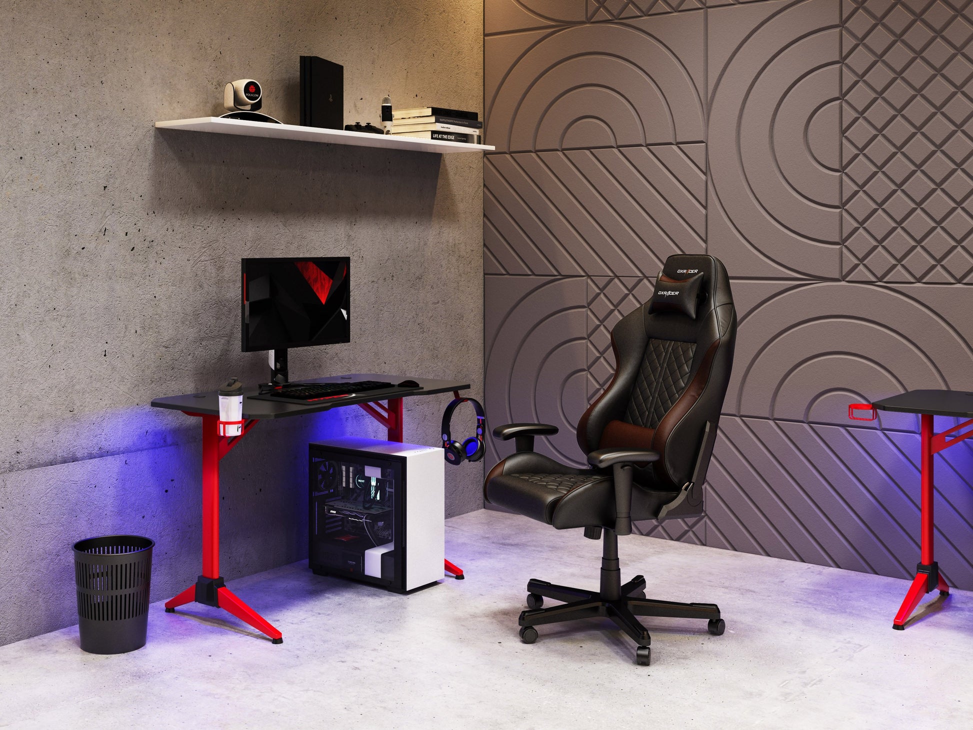 Red and black gaming desk with LED lights, sleek design, carbon fiber texture, built-in cup holder, headphone hook, and spacious surface for multiple monitors and gaming accessories.